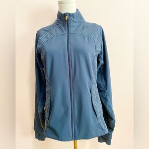Lululemon Blue Zip up Jacket with polkadots and pocket on back.